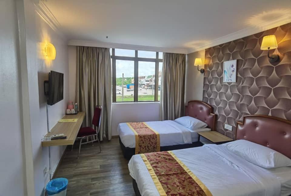 Hotel Ching Hua Сегамат Екстериор снимка
